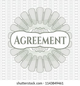 Green abstract linear rosette with text Agreement inside