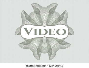 Green abstract linear rosette with text Video inside