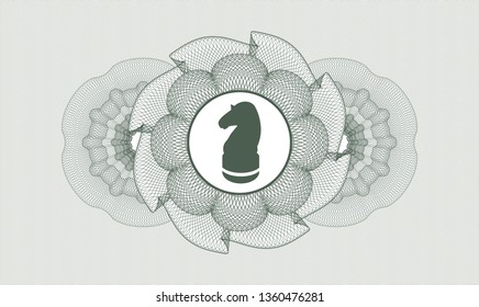 Green abstract rosette with chess knight icon inside