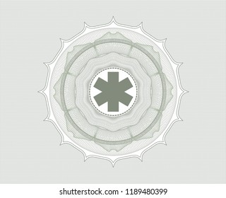 Green abstract rosette with emergency cross icon inside