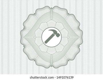 Green abstract rosette with hammer icon inside