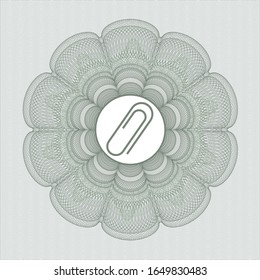 Rosette abstracto verde con un icono de clip de papel dentro