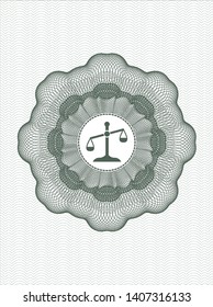 Green abstract rosette with scale icon inside