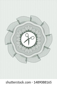 Green abstract rosette with scissors icon inside