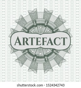 Green abstract rosette with text Artefact inside