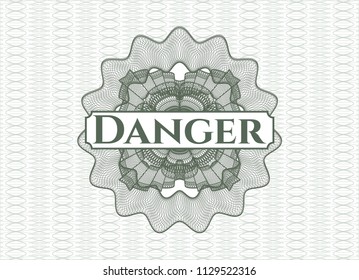 Green abstract rosette with text Danger inside