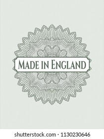 Green abstract rosette with text Made in England inside