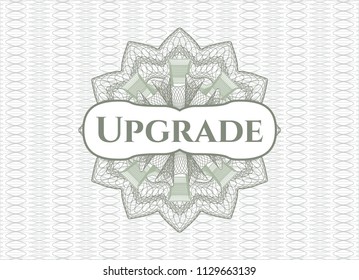 Green abstract rosette with text Upgrade inside