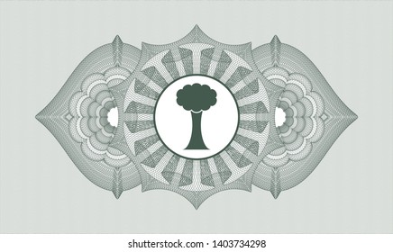 Green abstract rosette with tree icon inside