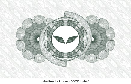Green abstract rosette with wings icon inside