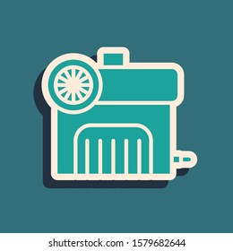 Green Air compressor icon isolated on blue background. Long shadow style. Vector Illustration
