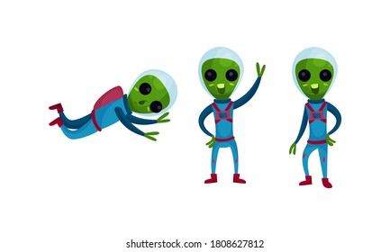 Green Alien Creatures in Spacesuit Standing and Waving Hand Vector Set