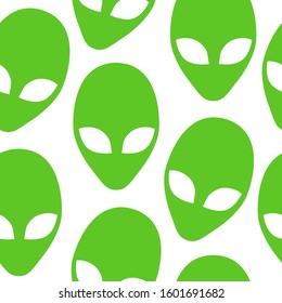 Green alien heads seamless pattern. Flat simple alien heads symbols repetitive vector illustration. EPS 10.