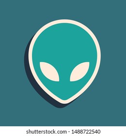 Green Alien icon isolated on blue background. Extraterrestrial alien face or head symbol. Long shadow style. Vector Illustration