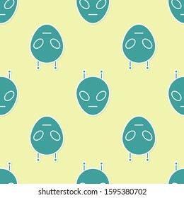 Green Alien icon isolated seamless pattern on yellow background. Extraterrestrial alien face or head symbol.  Vector Illustration