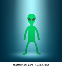 Green alien stands in the rays of light. Vector illustration.