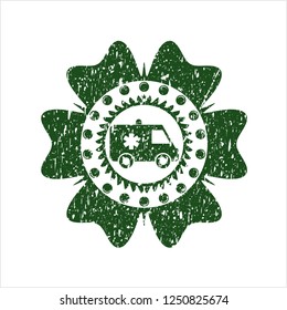 Green ambulance icon inside rubber seal