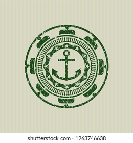 Green anchor icon inside distressed rubber stamp with grunge texture