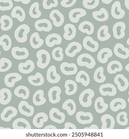 Green animal print seamless pattern with hand drawn spots