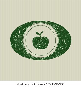 Green apple icon inside distressed grunge seal