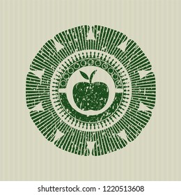 Green apple icon inside rubber grunge texture stamp
