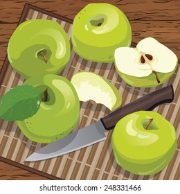 Green apple and a knife on the table. Apple cut , knife with wooden handle
