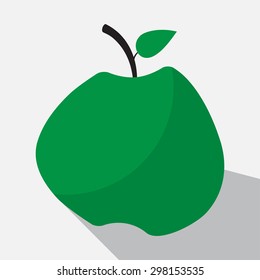 green apple and long shadow on a white background