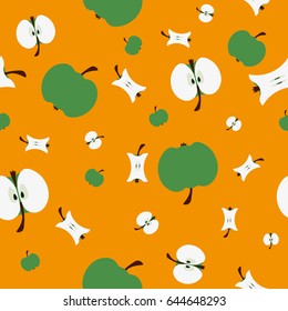 Green apples and half an apple on a yellow background. Seamless pattern background