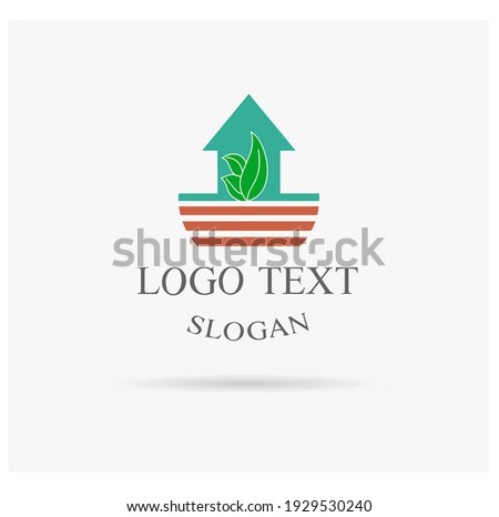 Green architecture logo, leaf with house symbol for company.