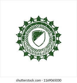 Green armor icon inside distressed rubber seal