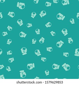 Green Astronaut helmet icon isolated seamless pattern on green background.  Vector Illustration