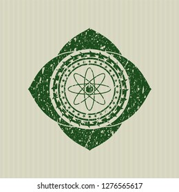 Green atom icon inside distress grunge style stamp