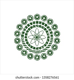 Green atom icon inside grunge stamp
