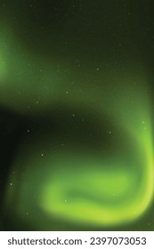 Green aurora borealis. Dark night starry sky and Northern lights