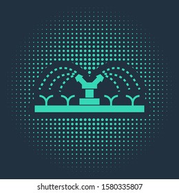Green Automatic irrigation sprinklers icon isolated on blue background. Watering equipment. Garden element. Spray gun icon. Abstract circle random dots. Vector Illustration