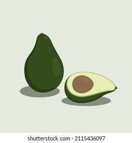 green avocado, one on a cut, on a white background
