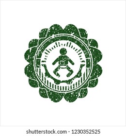 Green baby icon inside distressed grunge style stamp