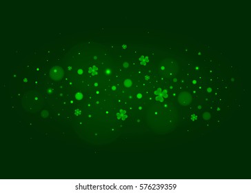 Green background with clover leafs. St Patrick's Day background.