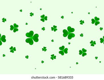 Green background with clover leafs. St Patrick's Day background.