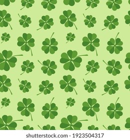 Green background with four leaf clovers, St. Patrick's Day background 