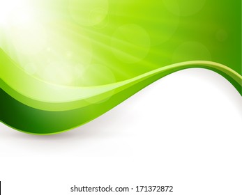 Green background with light burst, lens flare effects and a wave pattern. Great backdrop for any spring season theme. Copy space.