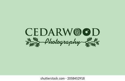 A green background with the name cedarwood photography.