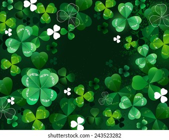 Green background with shamrock with four and three leaves. 