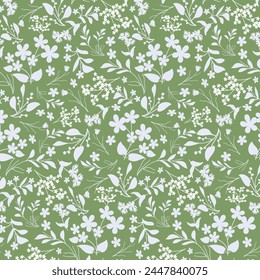 Green background with white flowers.Vector seamless pattern with white flowers and leaves on a green background.