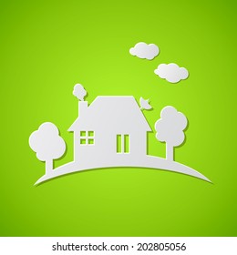 Green background with white paper house