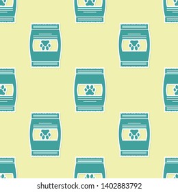 Green Bag of food for pet icon isolated seamless pattern on yellow background. Food for animals. Pet food package. Dog or cat paw print. Vector Illustration