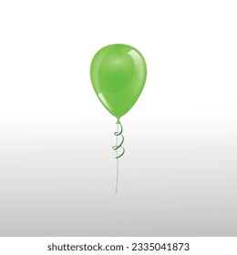 Green balloon isolated on a white background. Concept of birthday and anniversary celebration