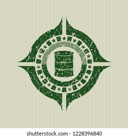 Green barrel icon inside grunge stamp