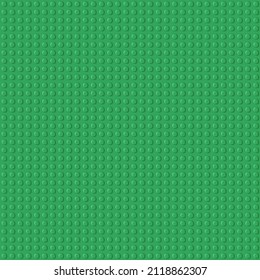 Green baseplate with rows of round knots to assembly plastic bricks from popular toy brand