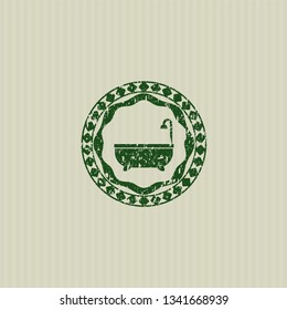 Green bathtub icon inside distressed grunge stamp